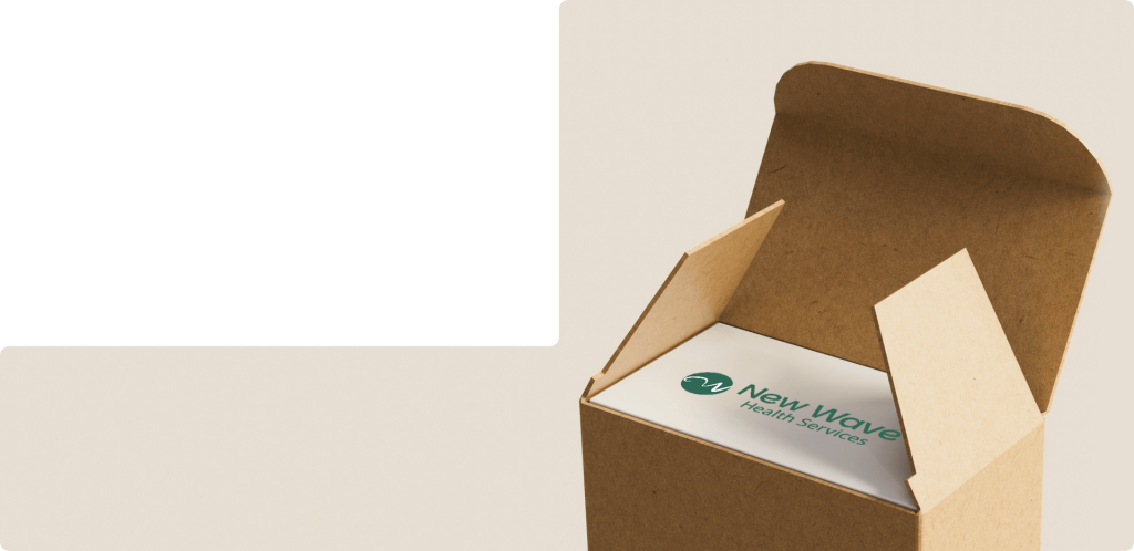 A cardboard box is open, revealing a business card inside with the logo and text "New Wave Health Services" on it.